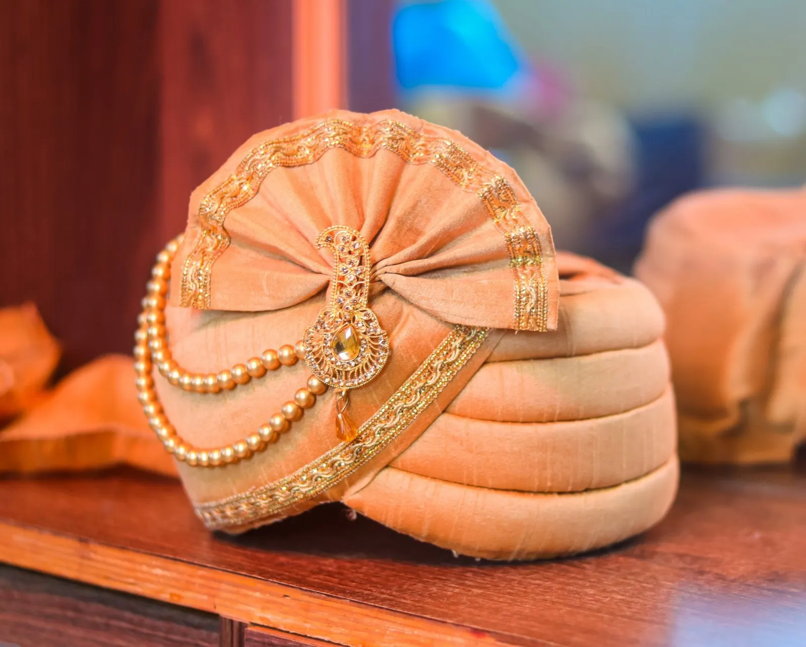 A groom's safa turban with a string of pearls