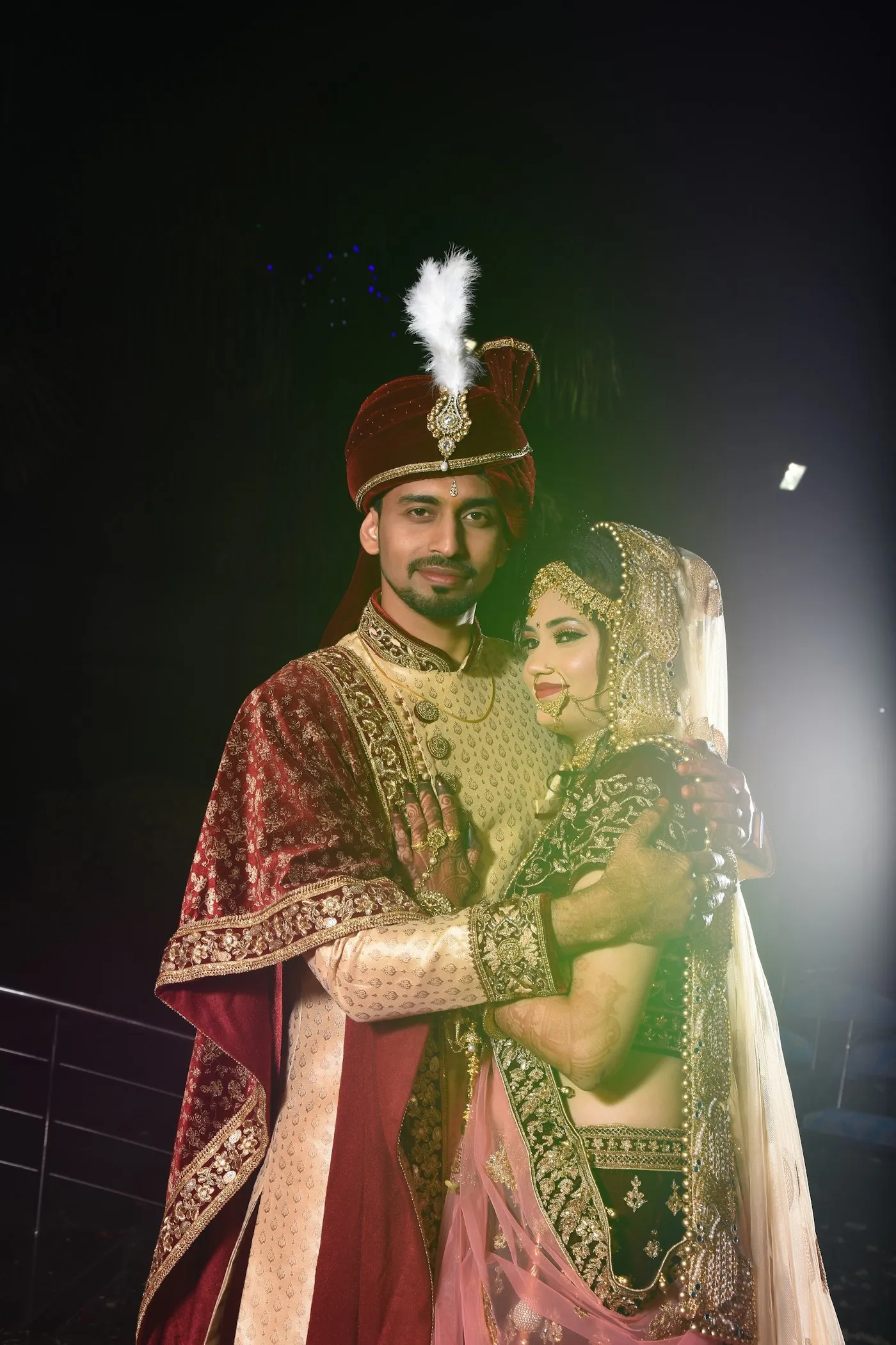 A bride and groom in wedding clothes